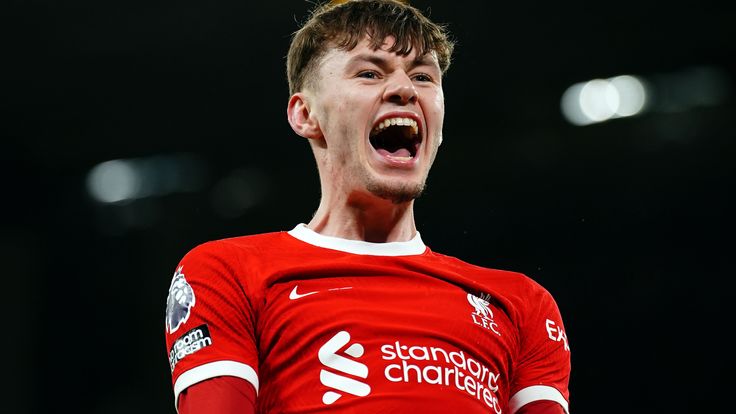 Liverpool's Conor Bradley celebrates after assisting their side's third goal of the game scored by Dominik Szoboszlai during the Premier League match at Anfield, Liverpool. Picture date: Wednesday January 31, 2024.