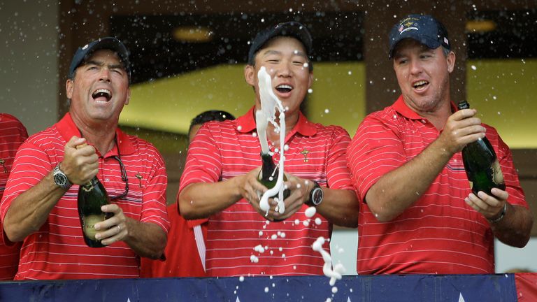 USA's assistance captain Olin Browne, left to right, Anthony Kim and Boo Weekley celebrate after winning the Ryder Cup golf tournament at the Valhalla Golf Club, in Louisville, Ky., Sunday, Sept. 21, 2008.  (AP Photo/Morry Gash)