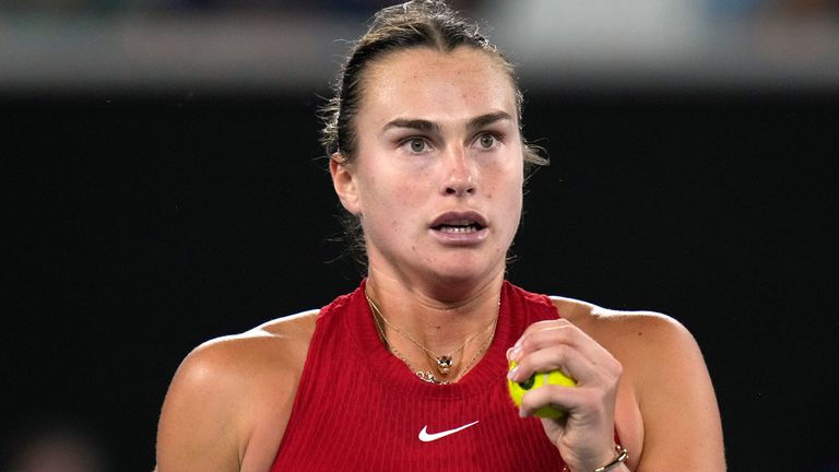 Aryna Sabalenka of Belarus reacts during her fourth round match against Amanda Anisimova of the U.S. at the Australian Open tennis championships at Melbourne Park, Melbourne, Australia, Sunday, Jan. 21, 2024. (AP Photo/Andy Wong)