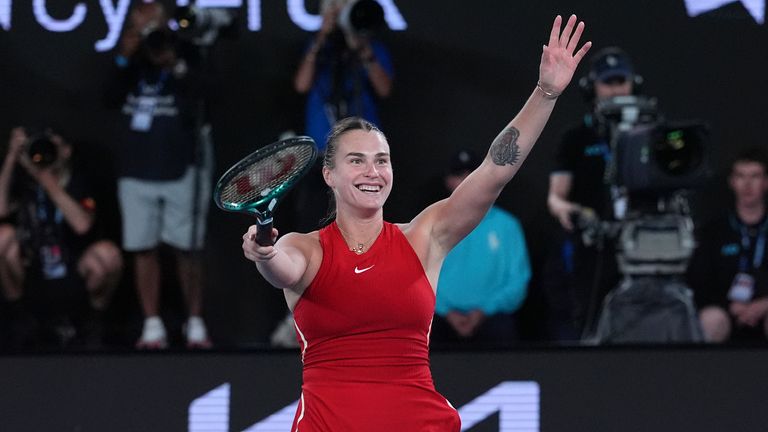 Aryna Sabalenka of Belarus celebrates after defeating Zheng Qinwen of China in the women's singles final at the Australian Open tennis championships at Melbourne Park, Melbourne, Australia, Saturday, Jan. 27, 2024. (AP Photo/Andy Wong)