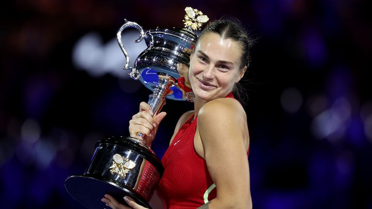 Aryna Sabalenka poses with the Daphne Akhurst Memorial Cup after the the Women's Singles Final match between Qinwen Zheng of China and Aryna Sabalenka during the 2024 Australian Open at Melbourne Park on January 27, 2024 in Melbourne, Australia. (Photo by Julian Finney/Getty Images)