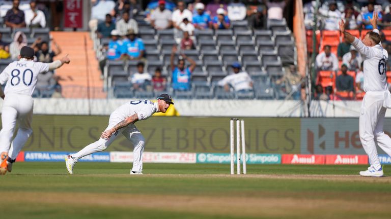 England's captain Ben Stokes, center, throws the ball to get India's Ravindra Jadeja run out on the fourth day of the first cricket test match between England and India in Hyderabad, India, Sunday, Jan. 28, 2024. (AP Photo/Mahesh Kumar A.)