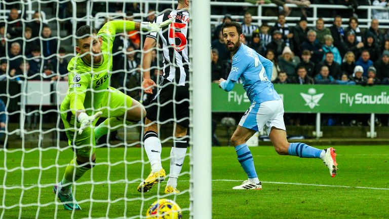 Manchester City's Bernardo Silva scores the opening goal