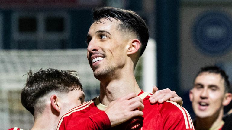 DINGWALL, SCOTLAND - JANUARY 02: Aberdeen's Bojan Miovski celebrates scoring to make it 3-0 with his teammates during a cinch Premiership match between Ross County and Aberdeen at the Global Energy Stadium, on January 02, 2024, in Dingwall, Scotland. (Photo by Ross Parker / SNS Group)