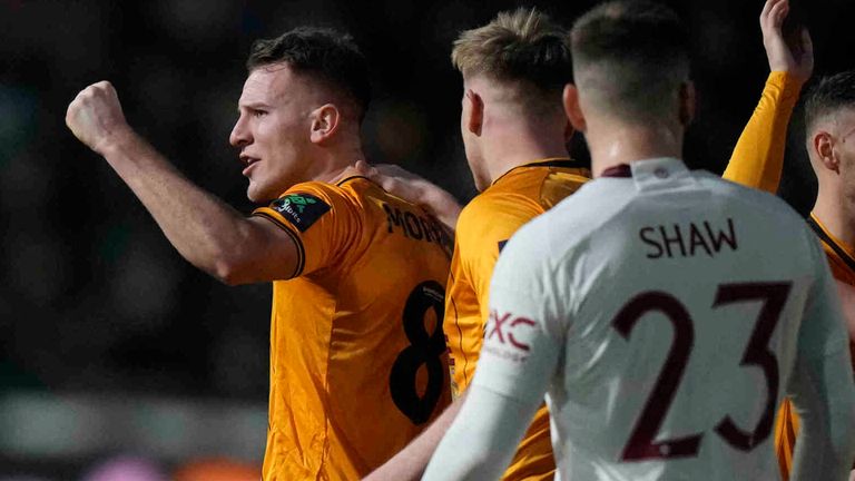 Bryn Morris celebrates after pulling a goal back for Newport County