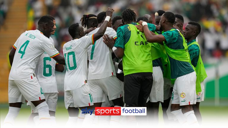 Senegal&#39;s players celebrate after teammate Lamine Camara scored