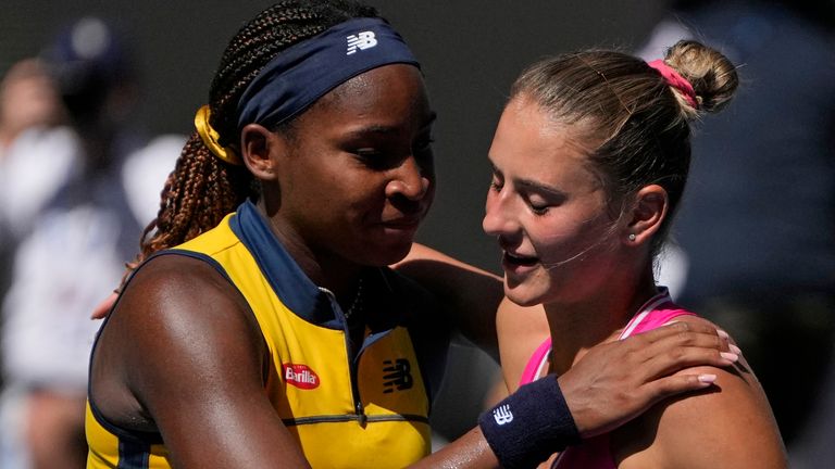 Coco Gauff, left, of the U.S. is congratulated by Marta Kostyuk of Ukraine following their quarterfinal match at the Australian Open tennis championships at Melbourne Park, Melbourne, Australia, Tuesday, Jan. 23, 2024. (AP Photo/Louise Delmotte)