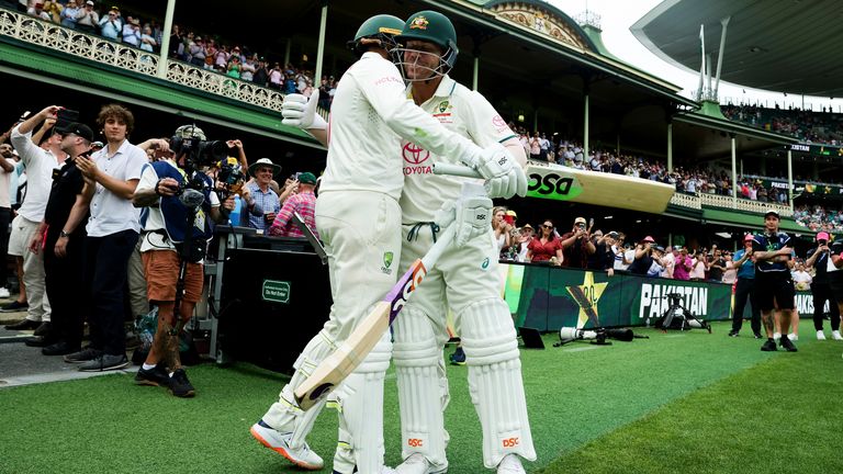 David Warner embraces Usman Khawaja as they open the batting in his last ever Test match 