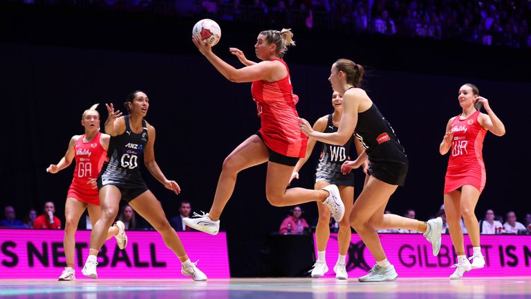 LEEDS, ENGLAND - JANUARY 27: Eleanor Cardwell of England jumps to catch the ball during the Vitality Netball Nations Cup match between England Vitality Roses and New Zealand Silver Ferns at First Direct Arena on January 27, 2024 in Leeds, England. (Photo by George Wood/Getty Images)