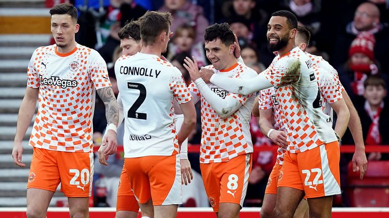 Albie Morgan celebrates with his team-mates after giving Blackpool a two-goal lead at Nottingham Forest