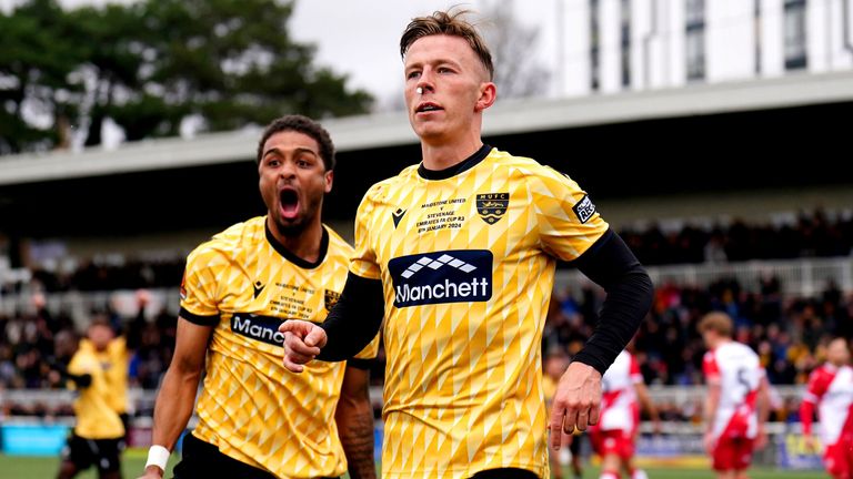 Sam Corne celebrates after giving Maidstone the lead against Stevenage