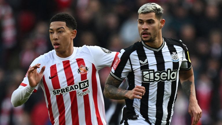 Jobe Bellingham vies with Bruno Guimaraes 