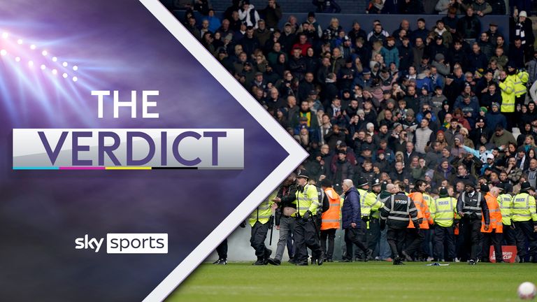 Police officers on the pitch after the match was halted after fans entered the field of play during the Emirates FA Cup fourth round match at The Hawthorns, West Bromwich. Picture date: Sunday January 28, 2024.