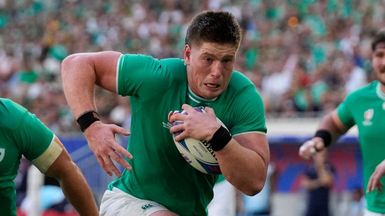 Ireland's Joe McCarthy runs to score a try during the Rugby World Cup Pool B match between Ireland and Romania at the Stade de Bordeaux in Bordeaux, France, Saturday, Sept. 9, 2023. (AP Photo/Themba Hadebe)