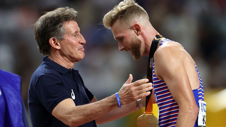 World athletics president Seb Coe congratulates Josh Kerr on his gold medal at the World Championships