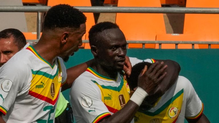 Senegal's Lamine Camara, second right, celebrates with teammates after scoring their side's second goal during the African Cup of Nations Group C soccer match between Senegal and Gambia at the Charles Konan Banny stadium in Yamoussoukro, Ivory Coast, Monday, Jan. 15, 2024. (AP Photo/Sunday Alamba)