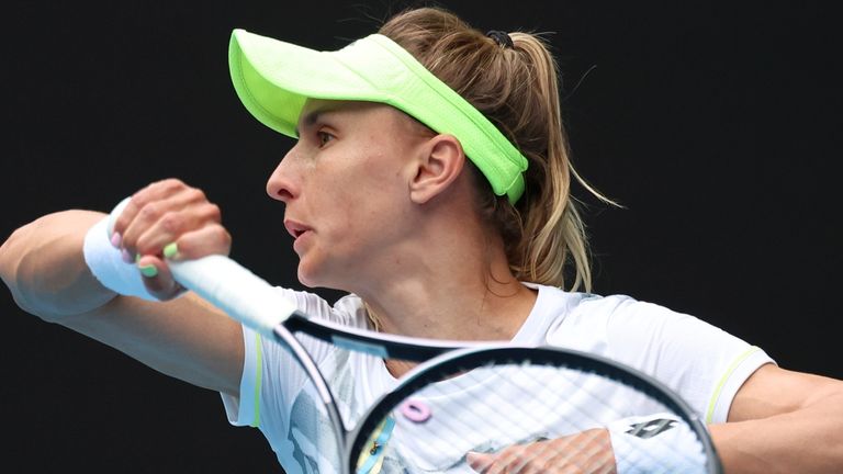 Lesia Tsurenko of Ukraine plays a forehand return to Aryna Sabalenka of Belarus during their third round match at the Australian Open tennis championships at Melbourne Park, Melbourne, Australia, Friday, Jan. 19, 2024. (AP Photo/Asanka Brendon Ratnayake)