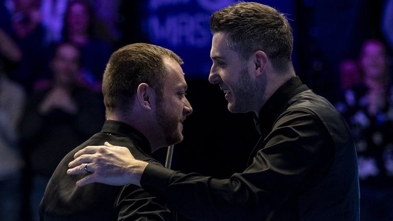 Mark Allen is congratulated by Mark Selby