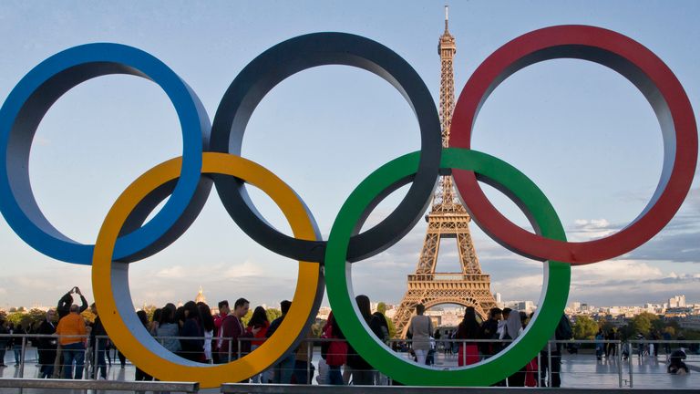 FILE - The Olympic rings are set up at Trocadero plaza that overlooks the Eiffel Tower, a day after the official announcement that the 2024 Summer Olympic Games will be in the French capital, in Paris on Sept. 14, 2017. The United States is predicted to top the medals tables ... both the overall count and gold-medal count ... for the 2024 Paris Olympics, according to one forecast released on Friday, Jan. 26, 2024, six months before the Games open on July 26. (AP Photo/Michel Euler, File)