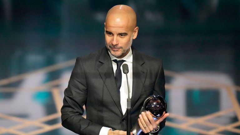 Manchester City's coach Pep Guardiola accepts the Best Men's Coach award during the FIFA Football Awards 2023 at the Eventim Apollo in Hammersmith, London, Monday, Jan. 15, 2024. (AP Photo/Kirsty Wigglesworth)
