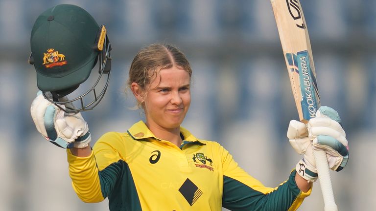 Australia's Phoebe Litchfield celebrates her century against India (Associated Press)