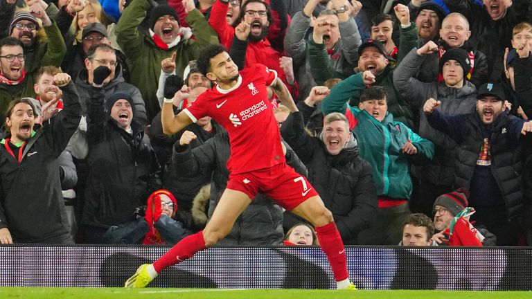 Luis Diaz celebrates in front of the home fans after scoring Liverpool's fourth goal against Chelsea