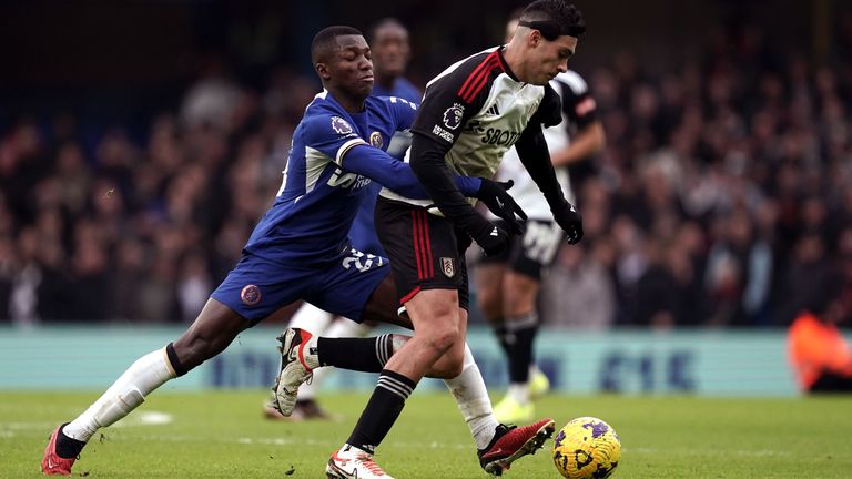 Chelsea&#39;s Moises Caicedo (left) and Fulham&#39;s Raul Jimenez (right) battle for the ball during the Premier League match at Stamford Bridge, London. Picture date: Saturday January 13, 2024.