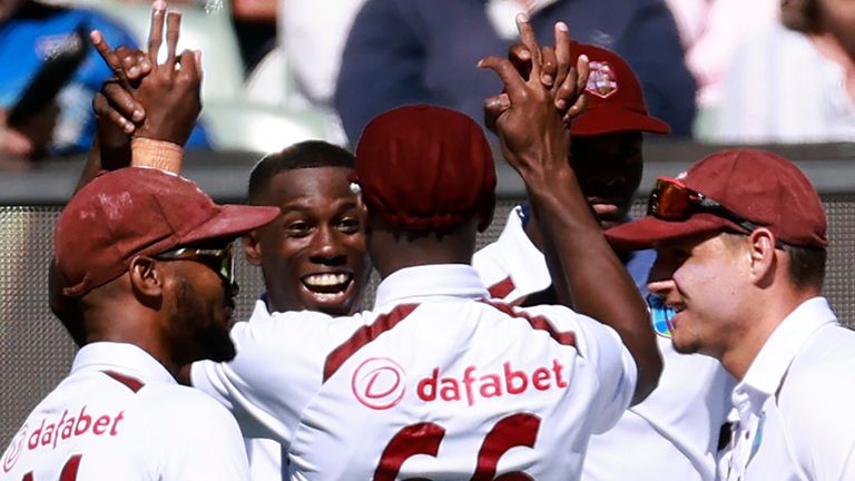 West Indies&#39; Shamar Joseph celebrates the wicket of Steve Smith (Associated Press)