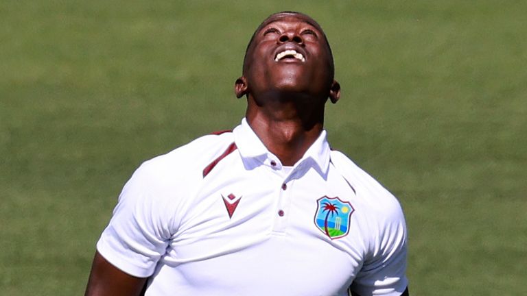 West Indies&#39; Shamar Joseph celebrates after taking the wicket of Australia&#39;s Steve Smith (Associated Press)