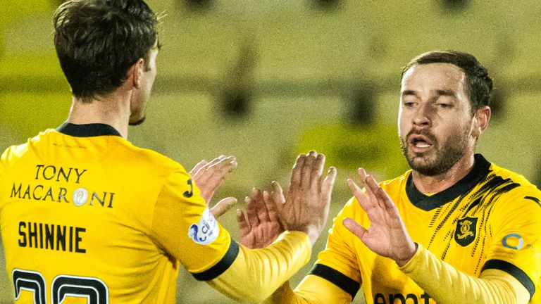 LIVINGSTON, SCOTLAND - JANUARY 30: Livingston's Scott Pitman (right) celebrates with Andrew Shinnie after scoring to make it 1-1 during a cinch Premiership match between Livingston and Ross County at the Tony Macaroni Arena, on January 30, 2024, in Livingston, Scotland. (Photo by Paul Devlin / SNS Group)