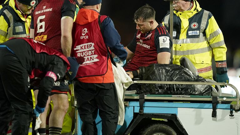Thomas Ahern was carted off after receiving a heavy blow to his head by the knee of the red carded Langdon