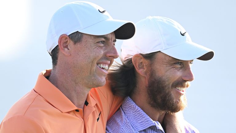 DUBAI, UNITED ARAB EMIRATES - JANUARY 14: Rory McIlroy of Northern Ireland and Tommy Fleetwood of England embrace on the 18th green as Fleetwood wins the Dubai Invitational at Dubai Creek Golf and Yacht Club on January 14, 2024 in Dubai, United Arab Emirates. (Photo by Alex Burstow/Getty Images)