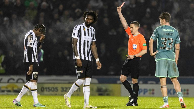 PAISLEY, SCOTLAND - JANUARY 02: Referee David Munro shows St Mirren's Toyosi Olusanya a red card for a high boot on Celtic's Joe Hart during a cinch Premiership match between St Mirren and Celtic at the SMiSA Stadium, on January 02, 2024, in Paisley, Scotland. (Photo by Craig Foy / SNS Group)