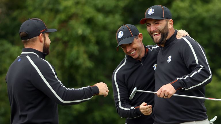 Tyrrell Hatton of England and team Europe, Rory McIlroy of Northern Ireland and team Europe, and Jon Rahm of Spain and team Europe react on the ninth during practice rounds prior to the 43rd Ryder Cup at Whistling Straits on September 23, 2021 in Kohler, Wisconsin. 