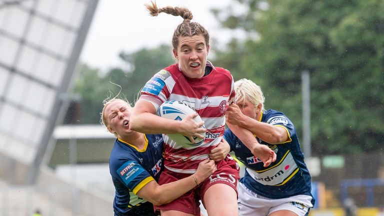 Picture by Allan McKenzie/SWpix.com - 23/07/2023 - Rugby League - Betfred Women&#39;s Challenge Cup Semi Final -  Wigan Warriors v Leeds Rhinos - Headingley Stadium, Leeds, England - Wigan&#39;s Vicky Molyneux is tackled by Leeds&#39;s Kiara Bennett & Jenna Greening.