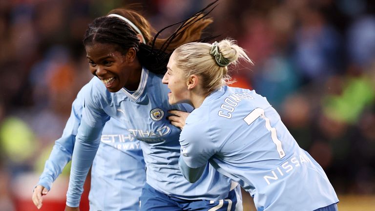 Khadija Shaw celebrates after extending Manchester City's lead against Liverpool