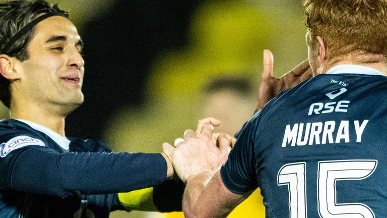 LIVINGSTON, SCOTLAND - JANUARY 30: Ross County's Simon Murray (no. 15) celebrates with Yan Dhanda after scoring to make it 1-0 during a cinch Premiership match between Livingston and Ross County at the Tony Macaroni Arena, on January 30, 2024, in Livingston, Scotland. (Photo by Paul Devlin / SNS Group)