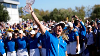 Europe's Team captain Suzann Pettersen lifts the trophy after wining the Solheim Cup