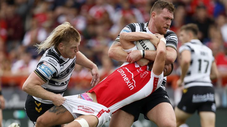 Hull KR v Hull FC - Betfred Super League - Sewell Group Craven Park
Hull KR's Jack Walker tackled by Hull FC's Brad Fash and Scott Taylor during the Betfred Super League match at Sewell Group Craven Park, Hull. Picture date: Sunday July 9, 2023.