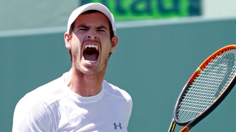 Andy Murray, of Great Britain, reacts after losing a point to Novak Djokovic, of Serbia, during the men's final match at the Miami Open tennis tournament Sunday, April 5, 2015, in Key Biscayne, Fla. (AP Photo/J Pat Carter)