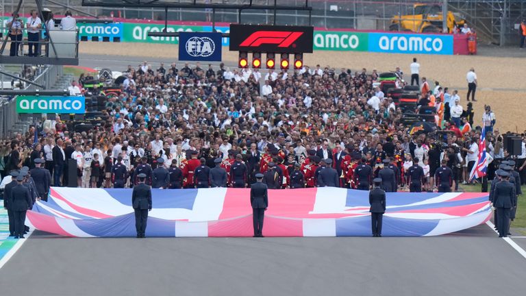 View of the parade before the British Formula One Grand Prix race at the Silverstone racetrack, Silverstone, England, Sunday, July 9, 2023. (AP Photo/Luca Bruno)