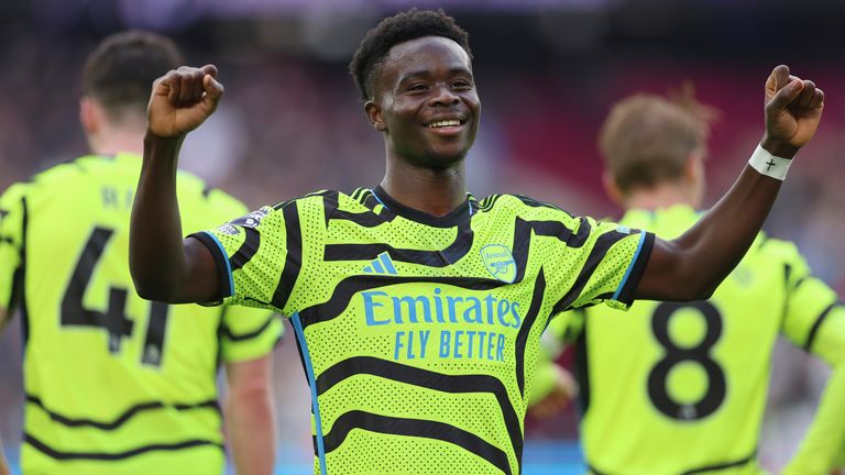 Arsenal's Bukayo Saka celebrates after scoring his second goal, Arsenal's fifth