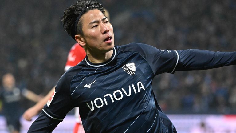 Takuma Asano celebrates after equalising for Bochum against Bayern Munich