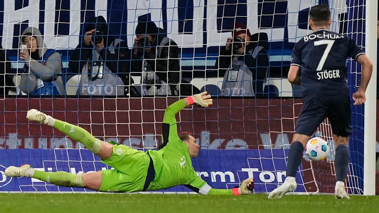 Kevin Stoeger scores a penalty to give Bochum a 3-1 lead over Bayern Munich