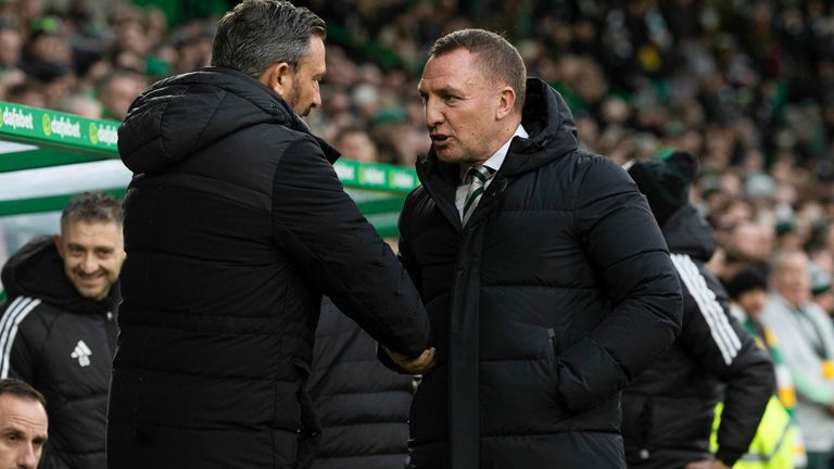 GLASGOW, SCOTLAND - FEBRUARY 17: Celtic Manager Brendan Rodgers shakes hands with Kilmarnock Manager Derek McInnes during a cinch Premiership match between Celtic and Kilmarnock at Celtic Park, on February 17, 2024, in Glasgow, Scotland. (Photo by Craig Foy / SNS Group)