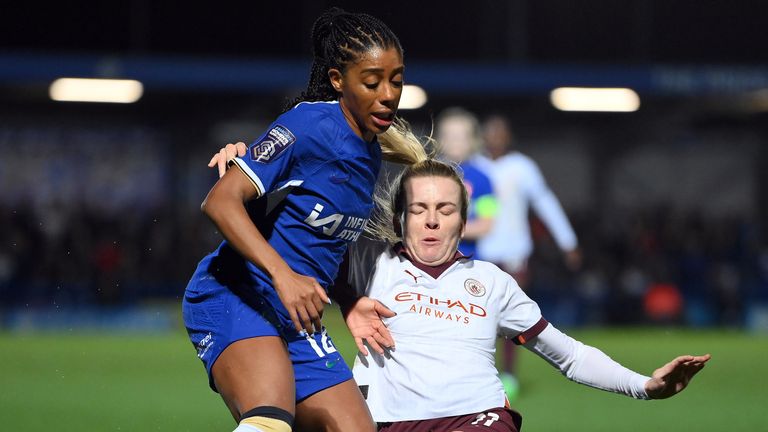  Lauren Hemp of Manchester City (R) tackles Ashley Lawrence of Chelsea 