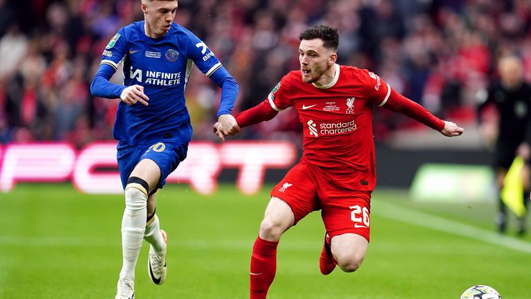 Chelsea's Cole Palmer and Liverpool's Andrew Robertson (right) during the Carabao Cup final
