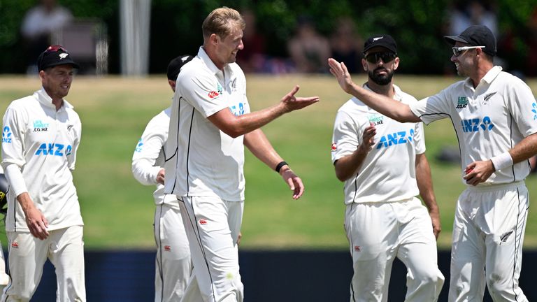 New Zealand Kyle Jamieson, centre, is congratulated by teammate Tim Southee, right, after taking the wicket of Raynard van Tonder on day four of the first cricket test between New Zealand and South Africa at Bay Oval, Mt Maunganui, New Zealand, Wednesday, Feb. 7, 2024. (Photo: Andrew Cornaga/Photosport via AP)