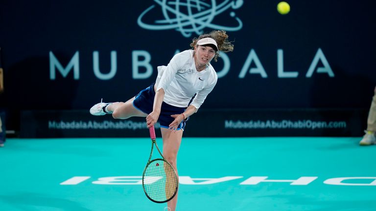 Cristina Bucsa of Spain serves to Heather Watson of Britain during a match of the Mubadala Abu Dhabi Open tennis tournament, in Abu Dhabi, United Arab Emirates, Thursday, Feb. 8, 2024. (AP Photo/Kamran Jebreili)