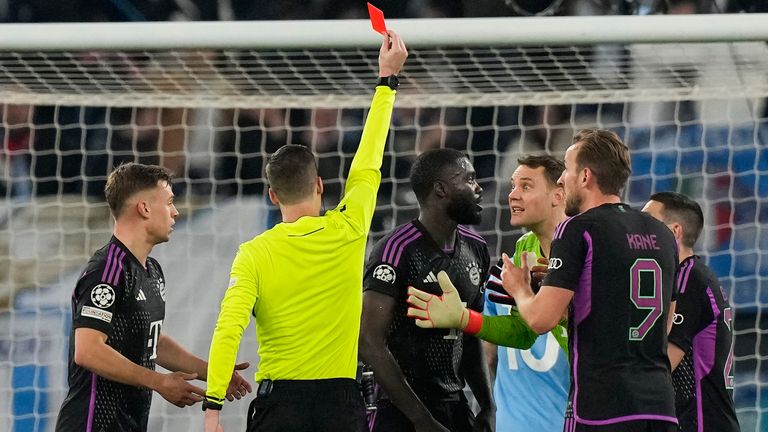 Bayern's Dayot Upamecano receives a red card by referee Francois Letexier during the Champions League game at Lazio